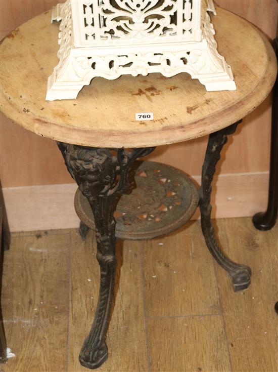 A Victorian black painted cast iron pub table, with later top W.59cm